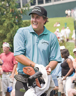 Phil Mickelson with bag of clubs - facts about phil mickelson