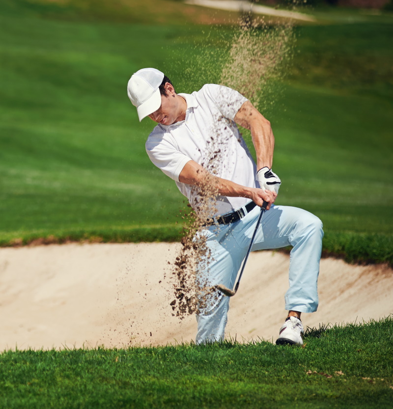 golf shoe technology keeping a golfer planted for a better shot out of the bunker