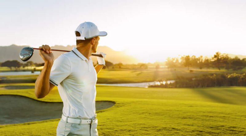 golfer on the course with a driver
